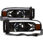02-05 Dodge Ram Projector Headlights w/ LED Light Bar - Black