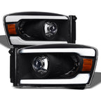 06-08 Dodge Ram Black Projector Headlights w/ LED Light Bar - Amber