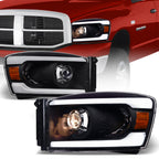 06-08 Dodge Ram Black Projector Headlights w/ LED Light Bar - Amber